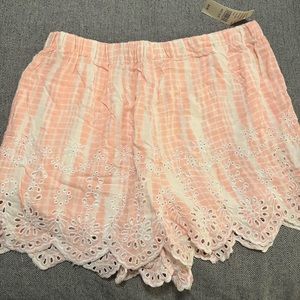 PAC Sun L.A. Hearts brand pink and white tie dye shorts.